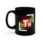 A black coffee mug with a white and red logo on the side. The logo features the chemical symbol for thorium (Th).Lightning bolts are behind and around the logo.